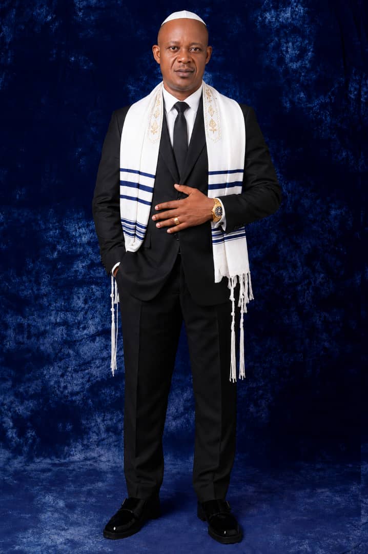 Pastor Goodluck in prayer shawl